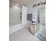 Bright and spacious bathroom featuring a large tub/shower combo with a tile surround at 4910 Pond Ridge Dr, Riverview, FL 33578