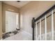 Entryway with staircase, tile flooring, and a view of the front door at 4910 Pond Ridge Dr, Riverview, FL 33578
