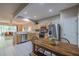 Well-lit kitchen with stainless steel appliances and an adjacent dining area at 4910 Pond Ridge Dr, Riverview, FL 33578