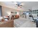 Cozy living area with bar seating open to kitchen and adjacent office space at 4910 Pond Ridge Dr, Riverview, FL 33578