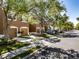 A well-maintained street view with neatly aligned townhomes and manicured lawns at 4910 Pond Ridge Dr, Riverview, FL 33578