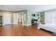 Spacious bedroom featuring hardwood floors, two closets, and neutral paint at 498 Lakewood Dr, Brandon, FL 33510