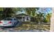 Delightful single-Gathering home with lush front yard landscaping and a well-kept lawn at 522 Mclennan St, Clearwater, FL 33756