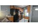 Efficient kitchen layout featuring dark appliances and stylish countertops at 522 Mclennan St, Clearwater, FL 33756