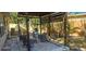Outdoor patio with seating under pergola, perfect for entertaining and grilling at 522 Mclennan St, Clearwater, FL 33756