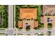 Aerial view showcasing the tile roof of the condominium and the well-maintained grounds at 5420 Cicerone St # 103, Sarasota, FL 34238