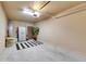 Spacious garage with ample storage, a clean floor, and potential for various uses at 5420 Cicerone St # 103, Sarasota, FL 34238