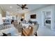 Relaxing living room with neutral tones and comfortable seating area at 5420 Cicerone St # 103, Sarasota, FL 34238