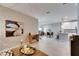 Open-concept living space showcasing stylish decor, a dining area, and modern kitchen at 5420 Cicerone St # 103, Sarasota, FL 34238