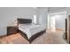 This main bedroom boasts a modern aesthetic and wood floors at 5473 Blue Heron Ln, Wesley Chapel, FL 33543