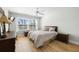 Relaxing bedroom with large windows, ceiling fan, and ample natural light at 6061 Bahia Del Mar Blvd # 112, St Petersburg, FL 33715