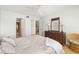 Bright bedroom with ceiling fan, wood floors, and furnishings, creating a relaxing retreat at 6061 Bahia Del Mar Blvd # 112, St Petersburg, FL 33715