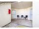 This condo has a covered entrance featuring a seating area with chairs and a white-colored door with a screen at 6061 Bahia Del Mar Blvd # 112, St Petersburg, FL 33715