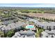 Aerial view of residential community with tennis courts, pool and waterfront access at 6915 Stones Throw N Cir # 3104, St Petersburg, FL 33710