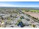 Panoramic aerial view of residential community featuring waterways and lush greenery at 6915 Stones Throw N Cir # 3104, St Petersburg, FL 33710