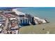 Overhead view of the property showcasing its position relative to the coastline at 7050 Sunset Way # 26, St Pete Beach, FL 33706