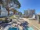 Outdoor lounge area with seating and tables, perfect for relaxing near the building at 7050 Sunset Way # 26, St Pete Beach, FL 33706