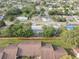 A charming neighborhood with mature trees and well-maintained homes is showcased in this aerial view at 7314 Princeton Dr, Hudson, FL 34667