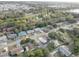 Expansive aerial view of the neighborhood, highlighting lush greenery, mature trees, and community feel at 7314 Princeton Dr, Hudson, FL 34667