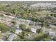 Community aerial shot showcasing the various residences, green spaces, and neighborhood layout at 7314 Princeton Dr, Hudson, FL 34667