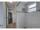 Renovated bathroom showcasing a tiled shower with glass, modern fixtures, and stylish design at 7314 Princeton Dr, Hudson, FL 34667