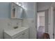 Well-lit bathroom with a new cabinet, tile accents, and lots of counter space at 7314 Princeton Dr, Hudson, FL 34667
