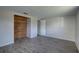 Bright bedroom with hard surface floors and an open closet at 7314 Princeton Dr, Hudson, FL 34667