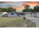 Charming single-story home featuring a stone facade and a well-maintained front yard at 7314 Princeton Dr, Hudson, FL 34667