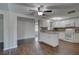 Updated kitchen with white cabinets, granite countertops, and stainless steel appliances at 7314 Princeton Dr, Hudson, FL 34667