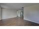 Spacious living room with modern flooring and neutral paint provides a versatile space at 7314 Princeton Dr, Hudson, FL 34667