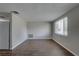 Open living room boasts beautiful flooring and a bright window, perfect for relaxing at 7314 Princeton Dr, Hudson, FL 34667