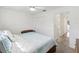 Bedroom with large closet, natural light, and neutral color scheme at 803 Helmsman Way, Palm Harbor, FL 34685