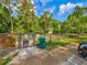 Well-maintained dog park entrance with clear signage and pet waste station promoting a clean environment at 803 Helmsman Way, Palm Harbor, FL 34685