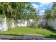 Fenced backyard, perfect for pets and outdoor activities at 914 Woodbridge Ct, Safety Harbor, FL 34695