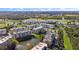 Stunning aerial view of a condo community with ponds and a beautiful golf course nearby at 960 Starkey Rd # 5406, Largo, FL 33771