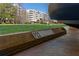 Close-up view of a reserved parking spot with building and greenery in the background at 960 Starkey Rd # 5406, Largo, FL 33771