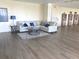Stylish lobby area with modern furniture, flooring, and decor at 100 Bluff View Dr # 417A, Belleair Bluffs, FL 33770