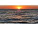 Tranquil ocean sunset view with peaceful water and beautiful orange sky at 100 Bluff View Dr # 417A, Belleair Bluffs, FL 33770