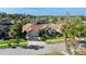 Beautiful home on a lush lot with verdant lawn and landscaping plus a pond at 10561 Greencrest Dr, Tampa, FL 33626