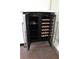 Close-up of a wine cooler inside the bathroom at 1208 E Kennedy Blvd # 1022, Tampa, FL 33602
