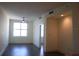 Bright and airy living room featuring modern lighting, ceiling fan, and neutral walls at 1208 E Kennedy Blvd # 1022, Tampa, FL 33602