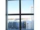 Window view showcasing an expansive cityscape with modern buildings and clear blue skies at 1208 E Kennedy Blvd # 1022, Tampa, FL 33602
