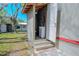 Outside building featuring a half bathroom with a vanity and tiled floors at 12303 Greenland Dr, Riverview, FL 33579