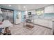 Roomy kitchen with stainless steel appliances, an island and ample counter space at 12303 Greenland Dr, Riverview, FL 33579