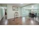 Open-concept living space flows into the dining area, perfect for entertaining at 12303 Greenland Dr, Riverview, FL 33579