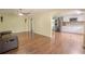 Spacious living room area leading into kitchen at 12303 Greenland Dr, Riverview, FL 33579
