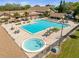 Aerial view showcasing the expansive community pool and hot tub at 1489 Dundee Dr, Palm Harbor, FL 34684