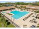 A large, inviting swimming pool with ample seating and lounging area for relaxation and socializing at 1489 Dundee Dr, Palm Harbor, FL 34684