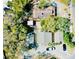 Birds-eye view of property showing building arrangement and surrounding foliage at 15 Shore Dr, Palm Harbor, FL 34683