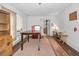 Bright dining room with a wooden table, hardwood floors, and vintage hutch at 15 Shore Dr, Palm Harbor, FL 34683